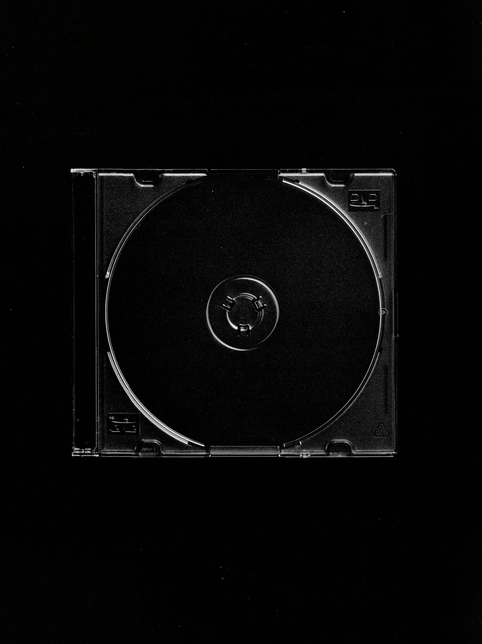 A CD jewel case photographed on a black background