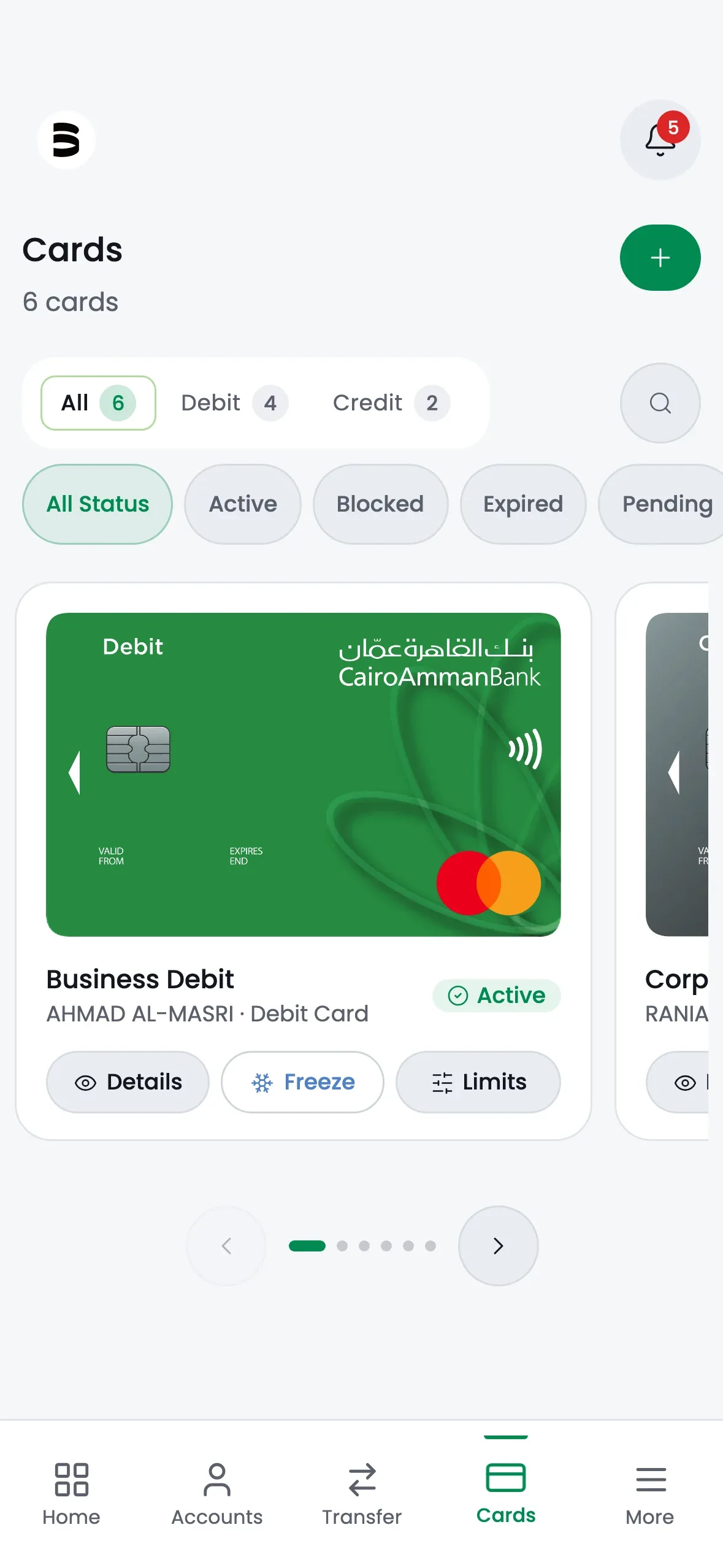 The mobile Cards screen at iPhone 15 Pro proportion, a horizontal row of corporate cards with status filters above them.
