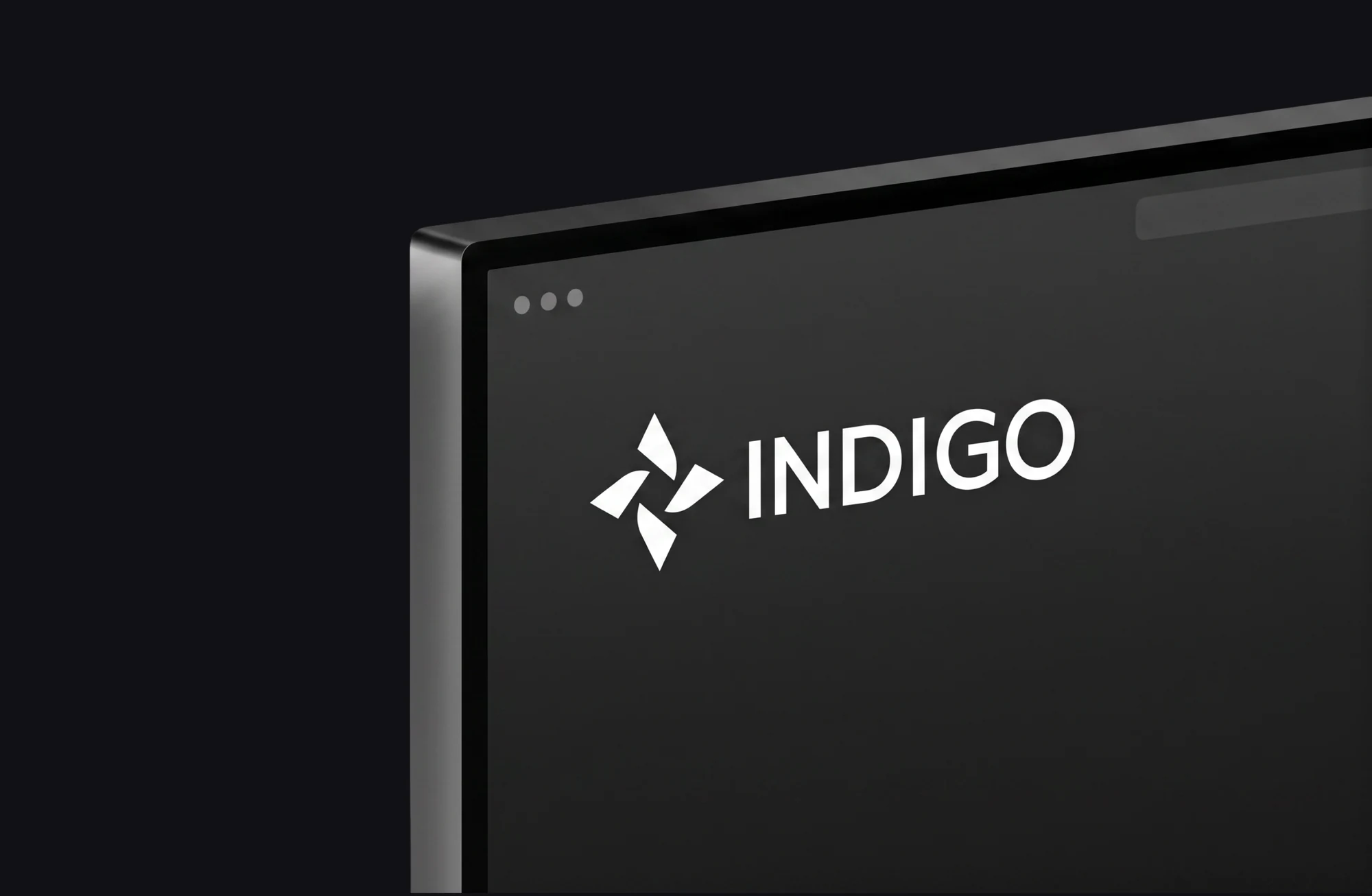 Indigo on screen: the lockup on a dark desktop interface