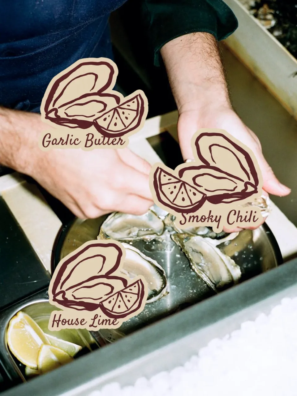 Three Local Shell die-cut sauce stickers over oysters on ice.