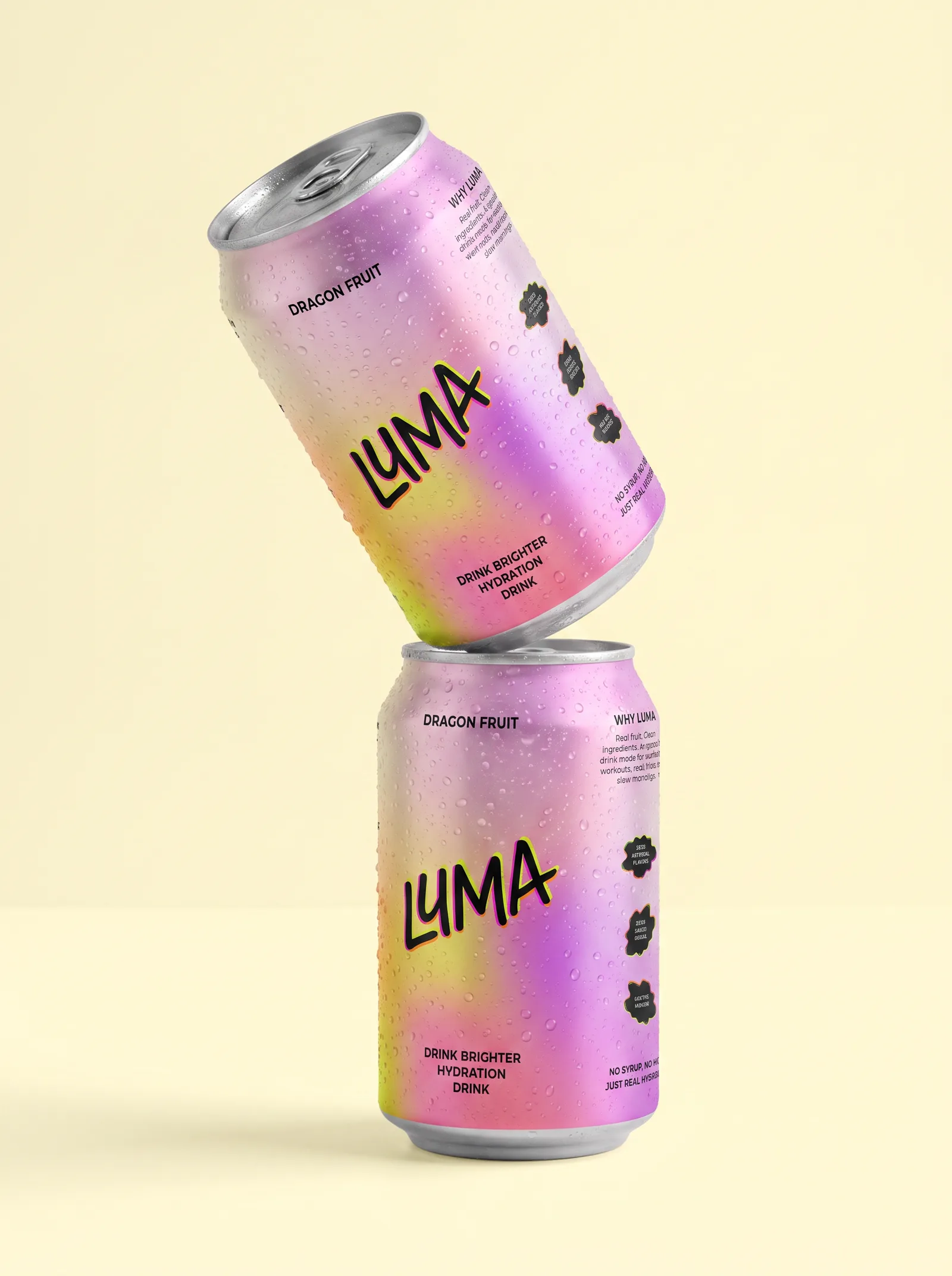 Two dewy Luma cans stacked, the top can tilted mid balance