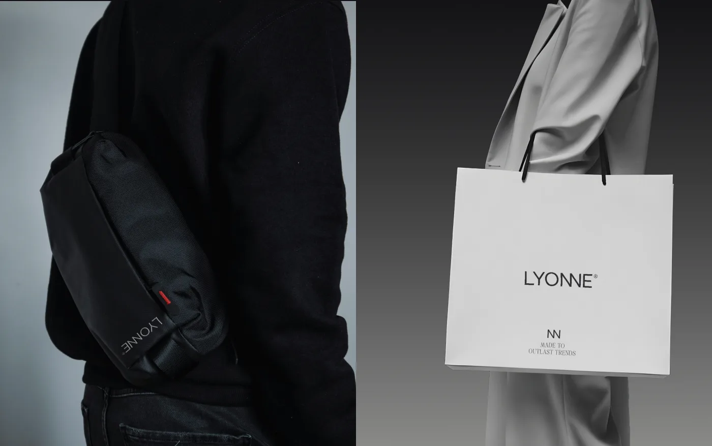 Black crossbody bag with a red woven Lyonne tab next to the white Lyonne shopping bag with monogram and tagline
