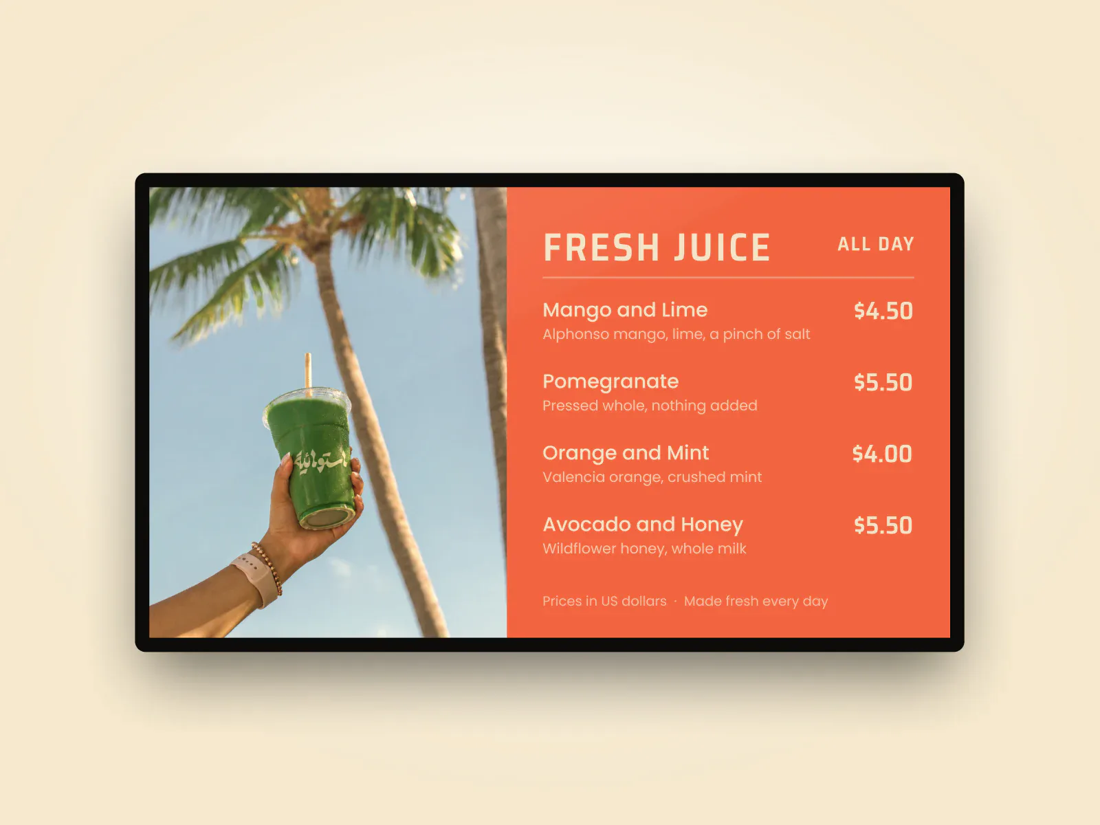 A digital menu screen: the juice list on coral beside a photo of a green juice under a palm.