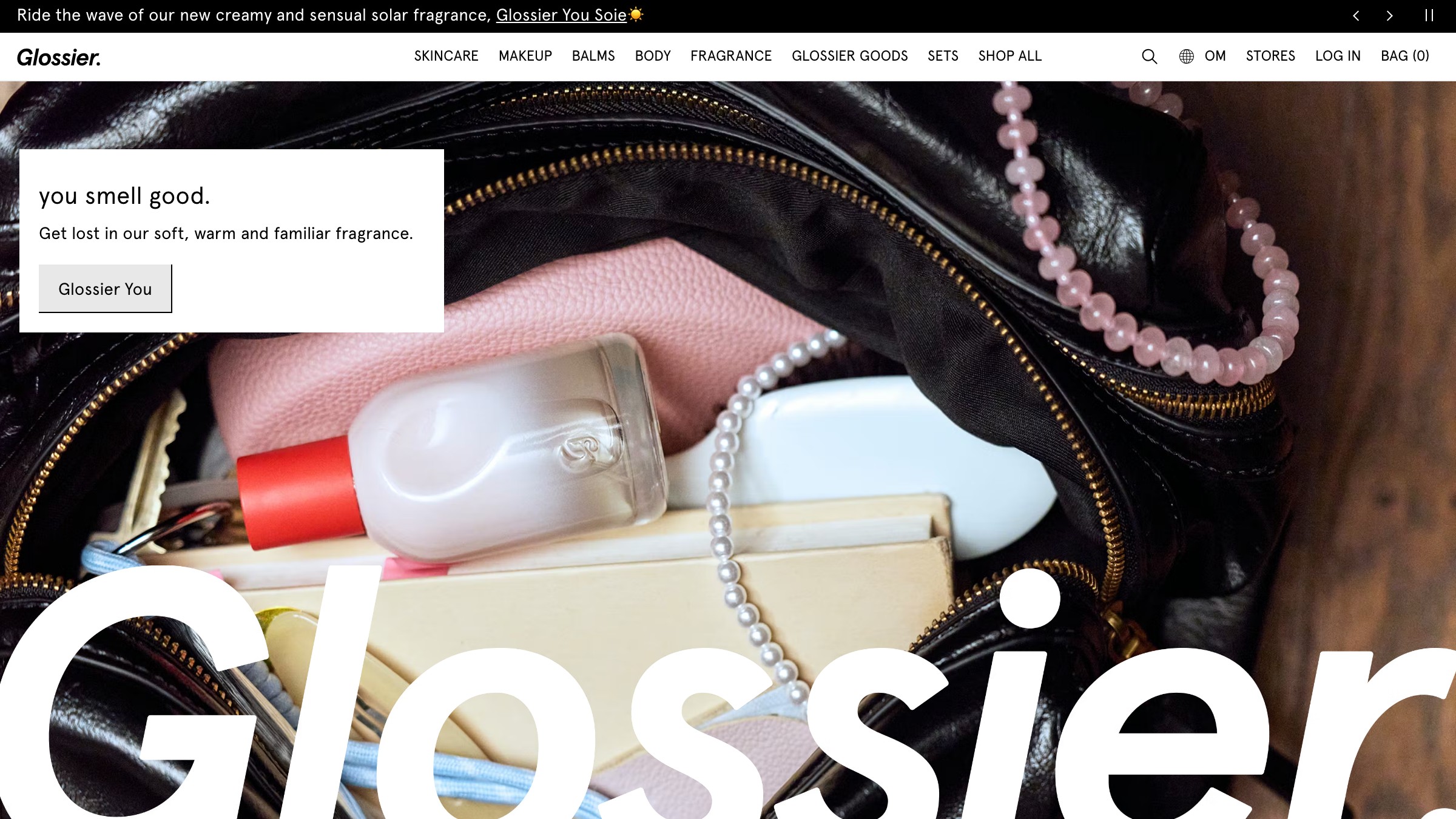 Glossier website showing the master brand anchoring You and Generation G sub-brand identities.