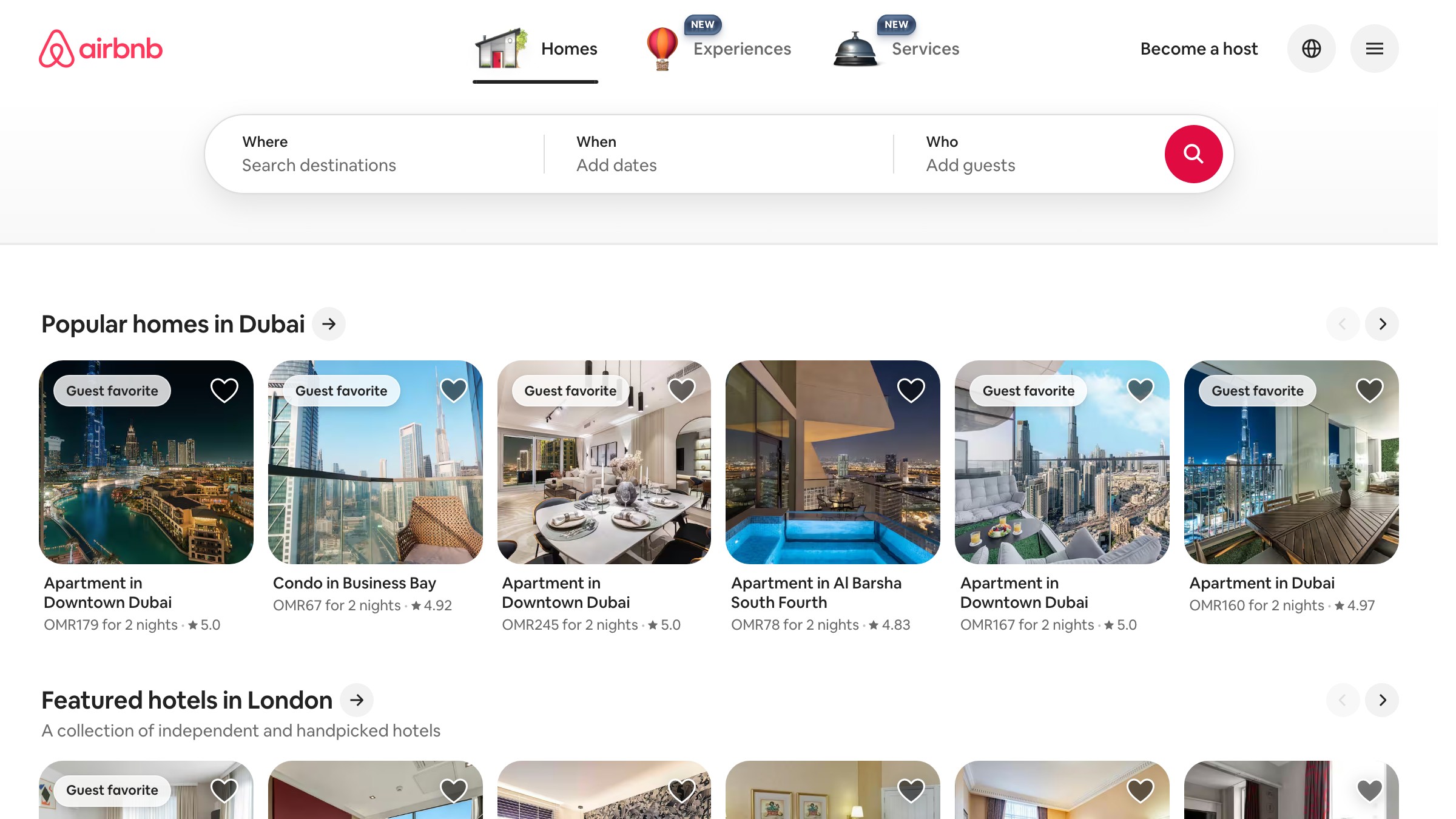 Airbnb homepage showing the Belo symbol and brand system in action