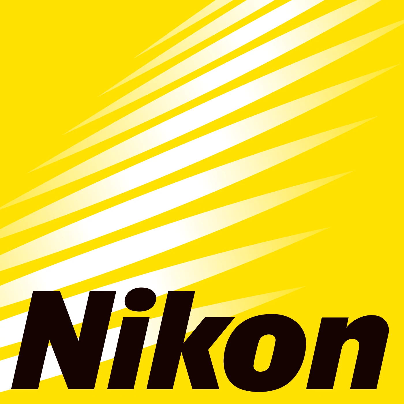 The Nikon logo, black letters and white light rays, on Nikon yellow