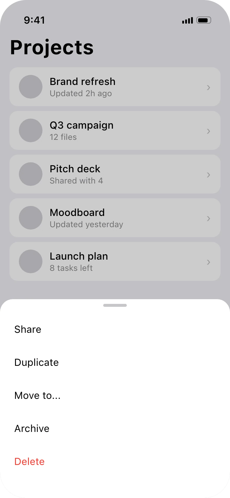 A bottom sheet with Share, Duplicate, Move to, Archive and a red Delete option